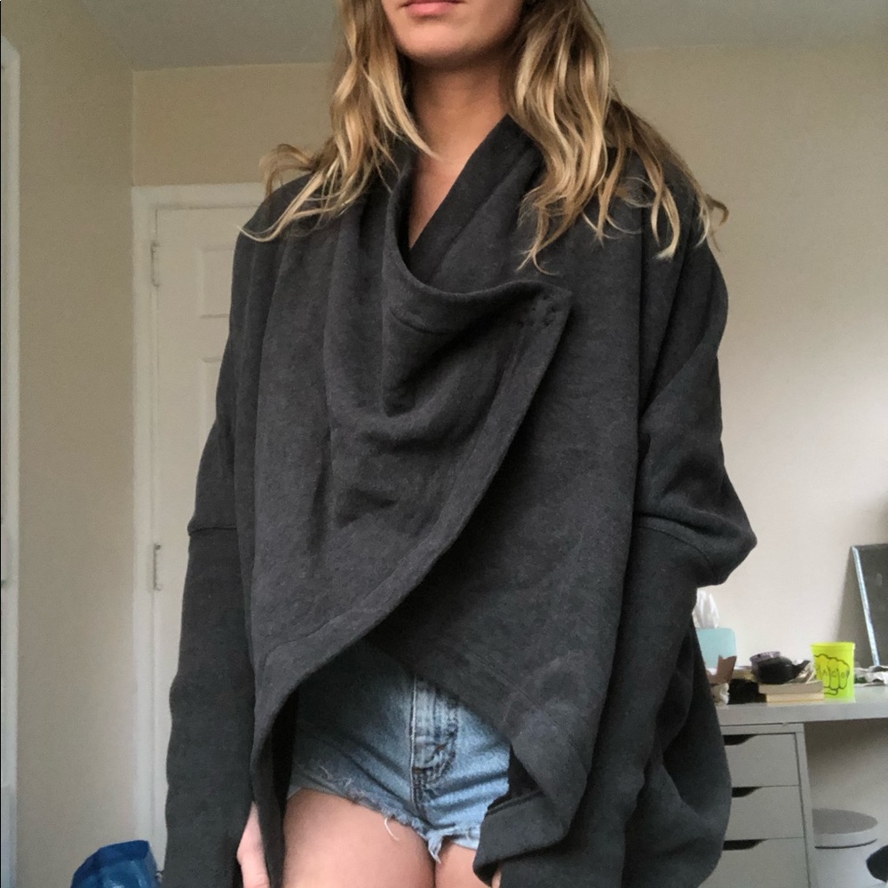 Never worn Lululemon wrap around sweater top!